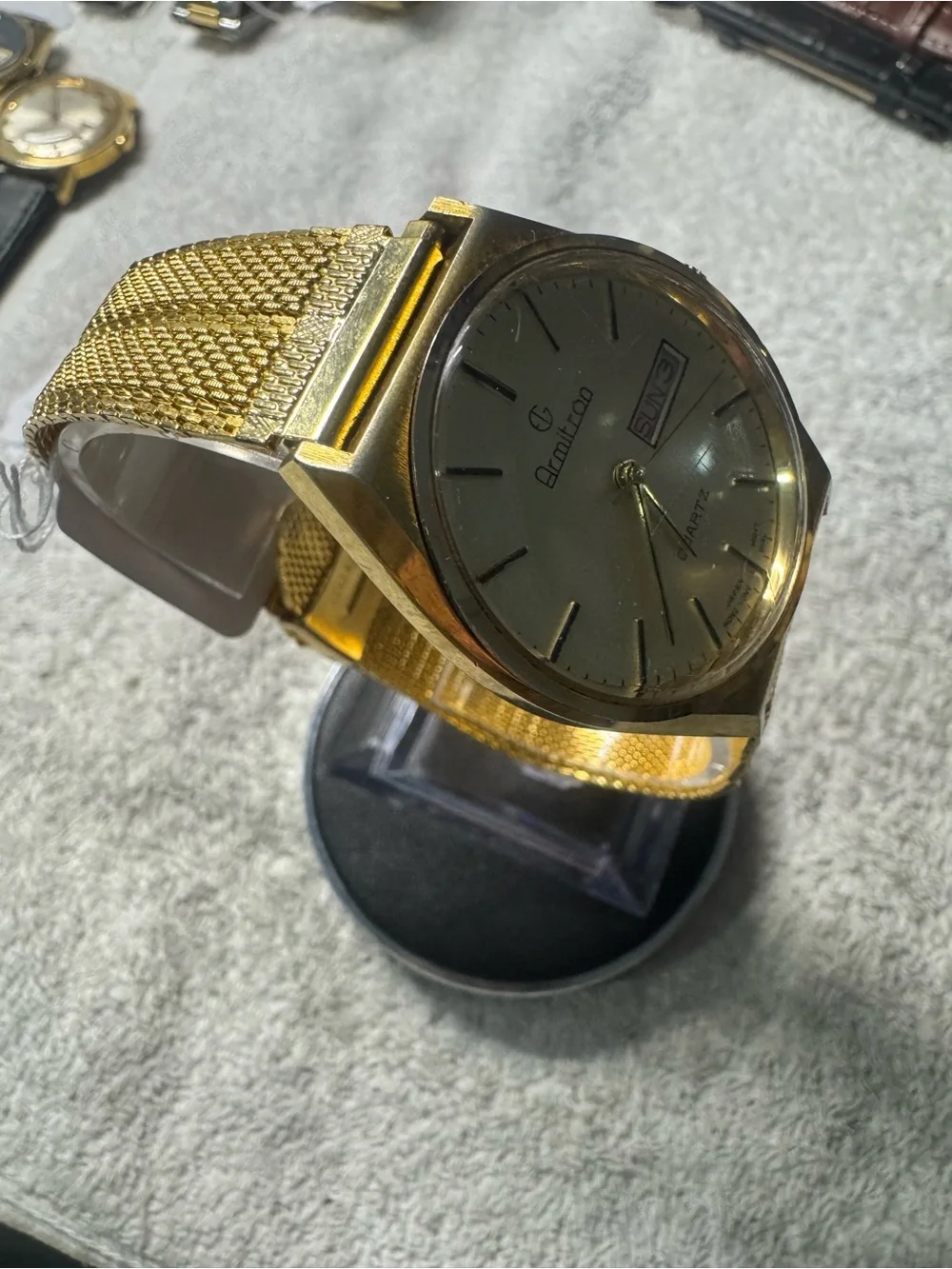 Armitron Gold Tone Watch with Day-Date Window